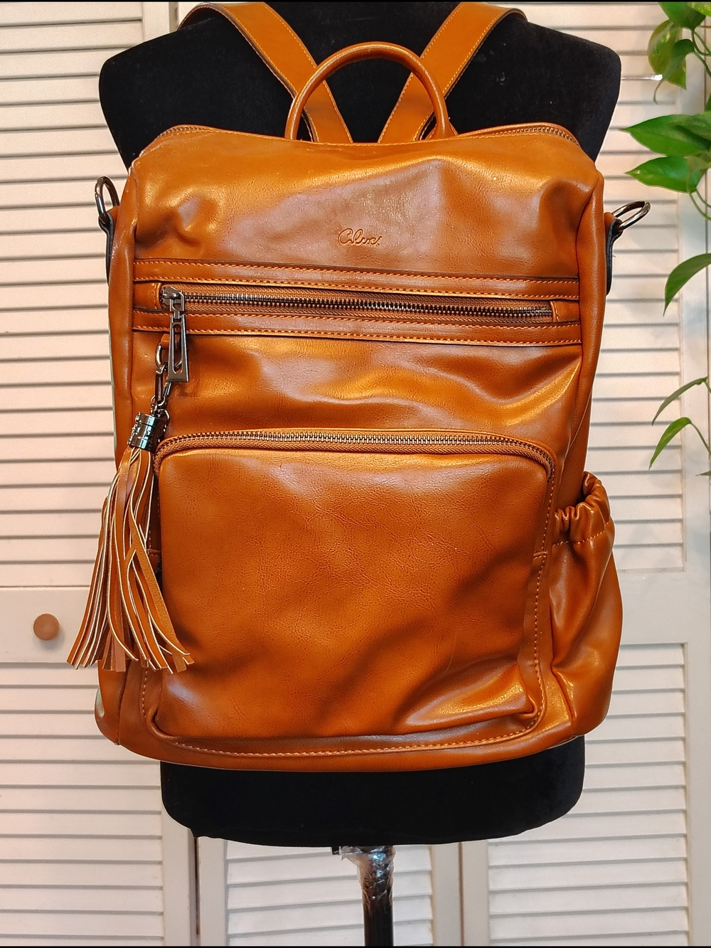 Cluci Chic Cognac Faux Leather Backpack with Tassel Accent - Good Condition